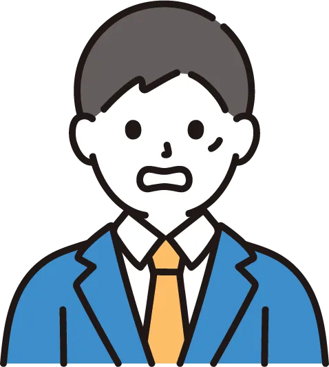 机に向かう男性
